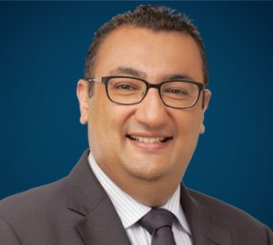 Meet Naizam Kanji, Director, Office of Mergers and Acquisitions